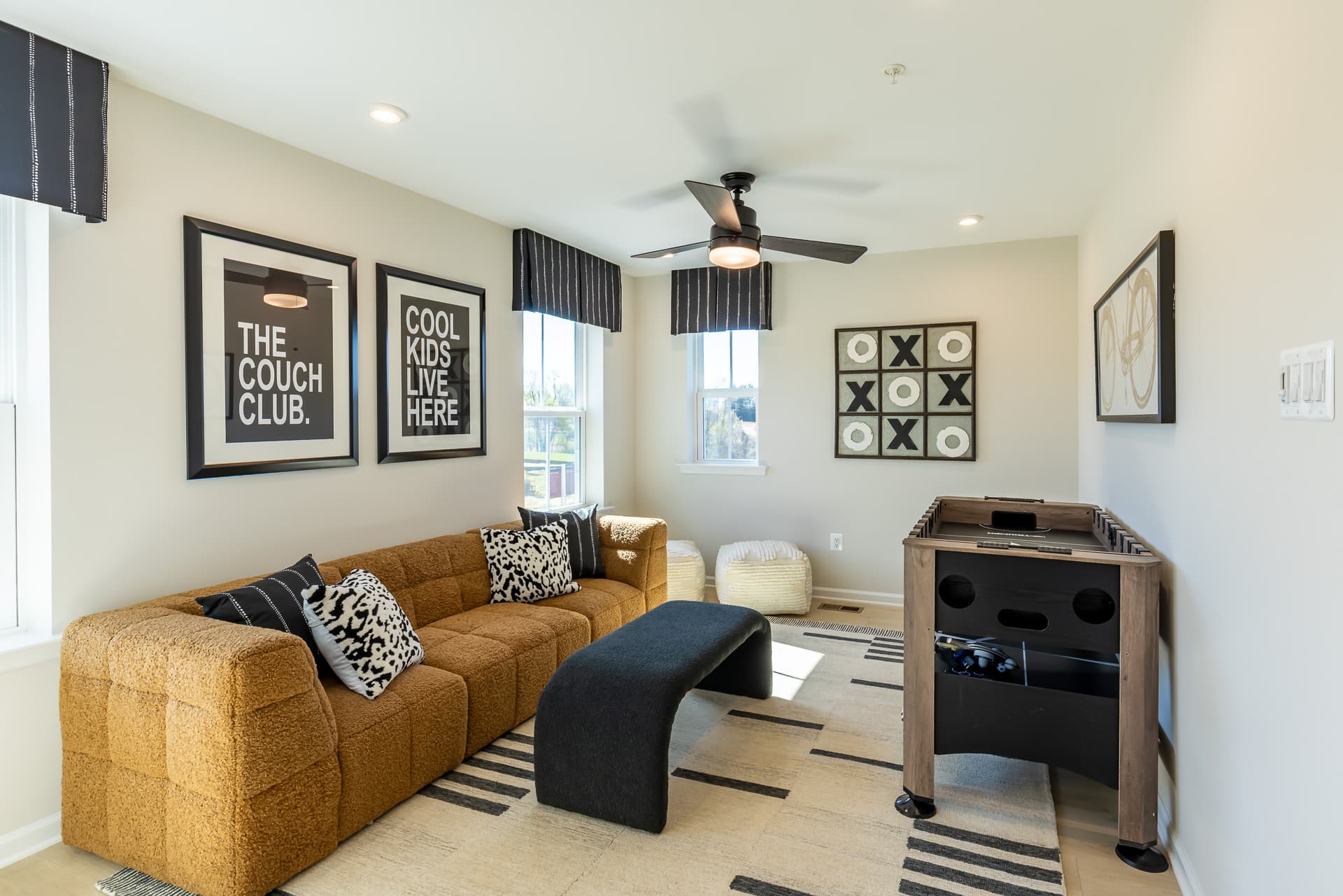2nd-floor loft with carpet and a couch