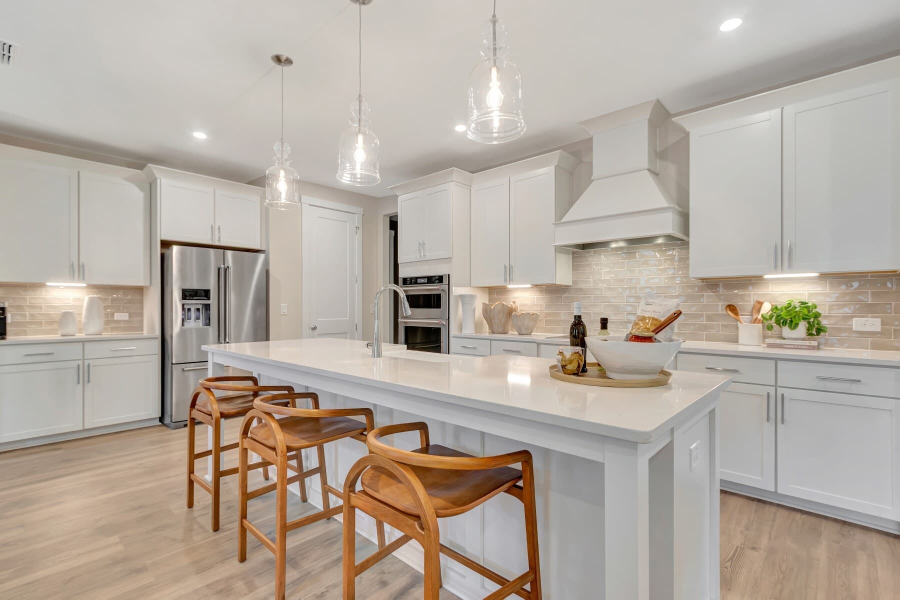kitchen with white cabinets and hardwood floors