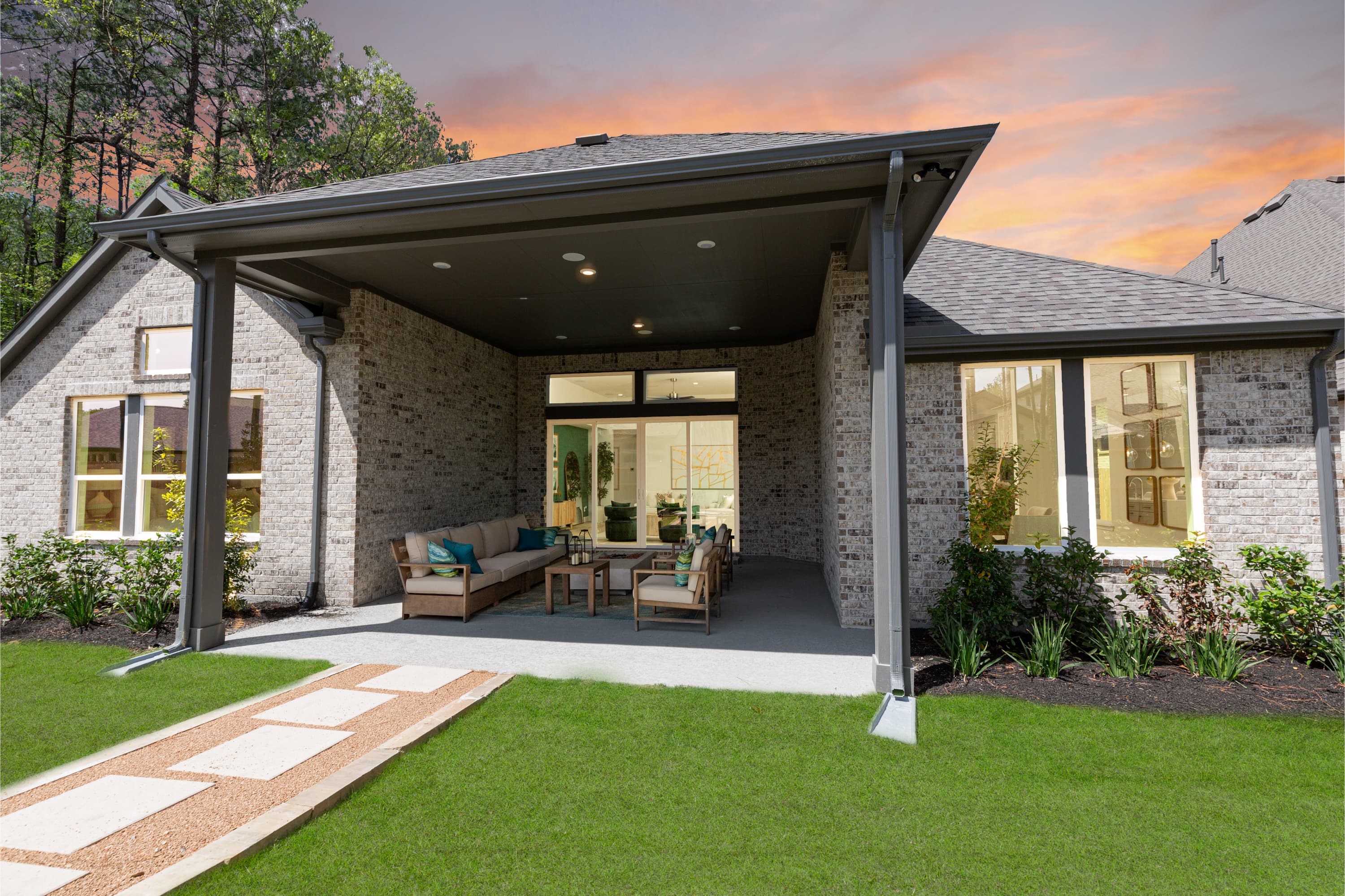 home exterior rear with covered patio and seating