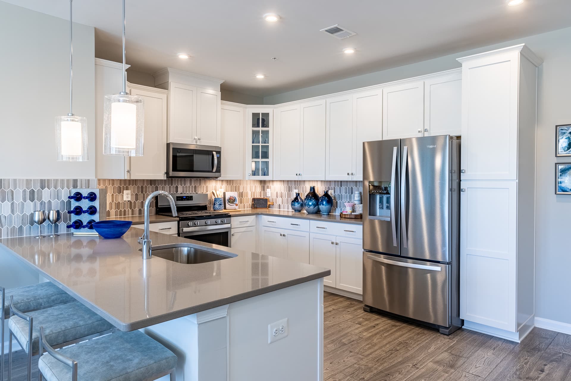 kitchen with a breakfast bar and barstools