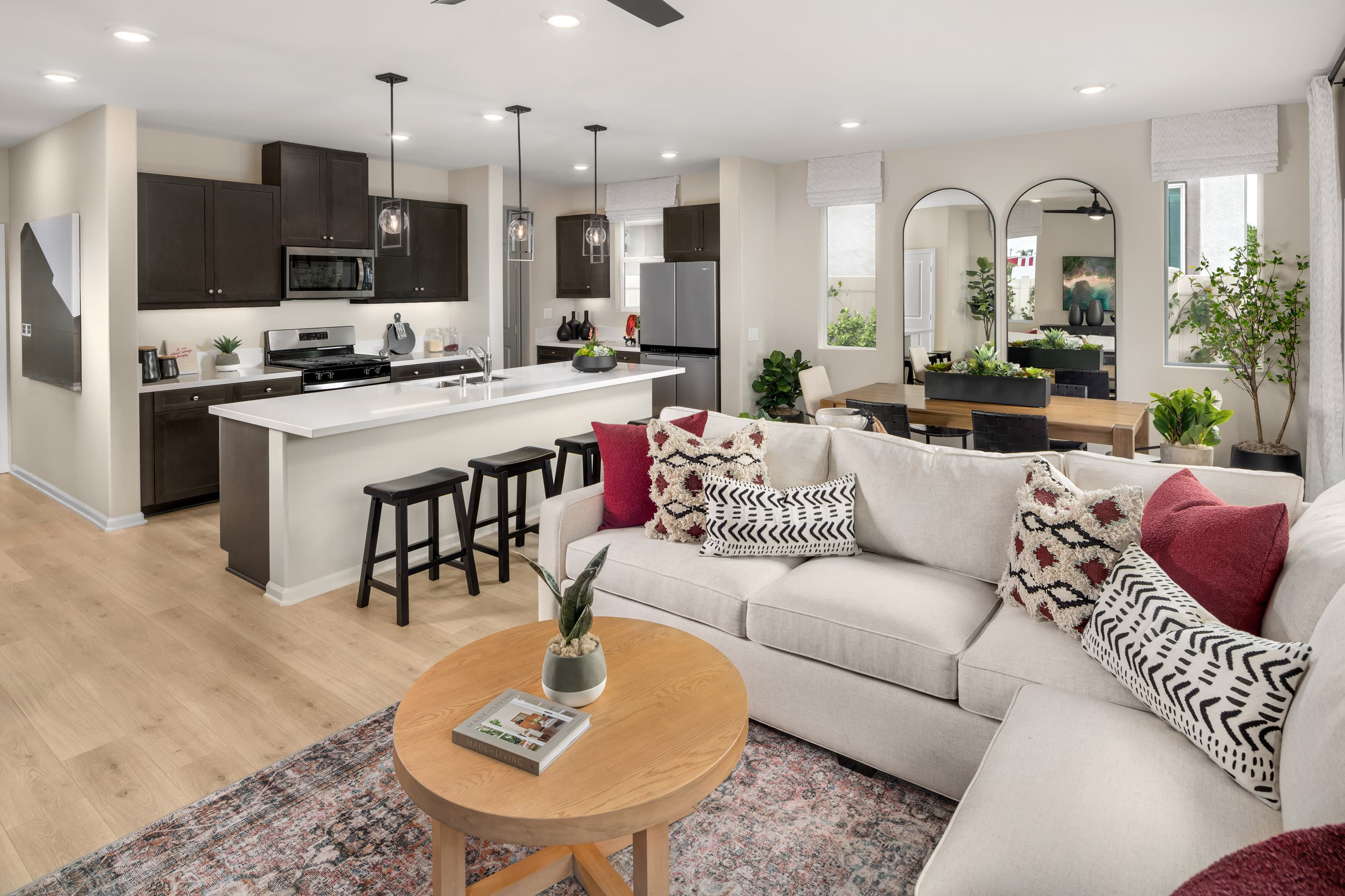 great room with dining area and neutral floors