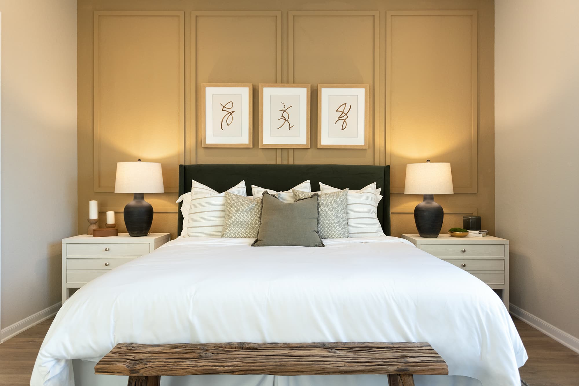 bedroom with brown flooring, windows & ceiling fan