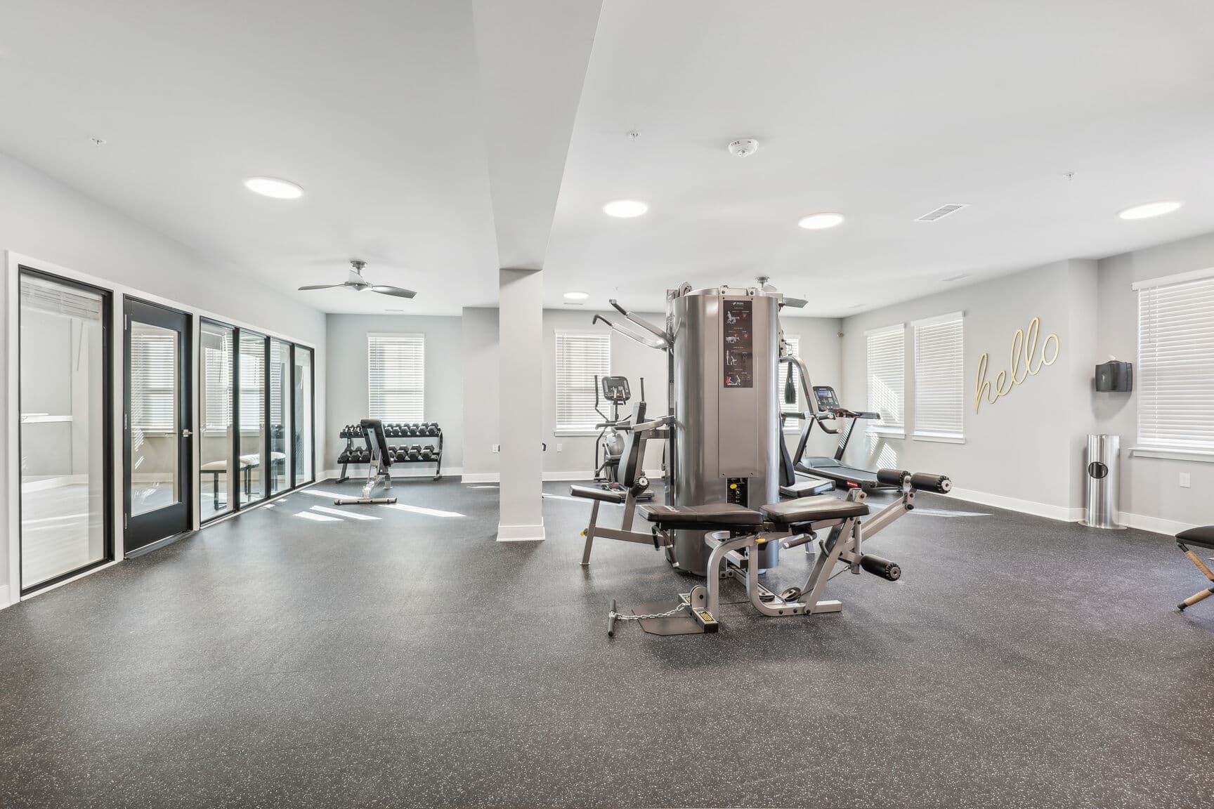 fitness center with machines and free weights