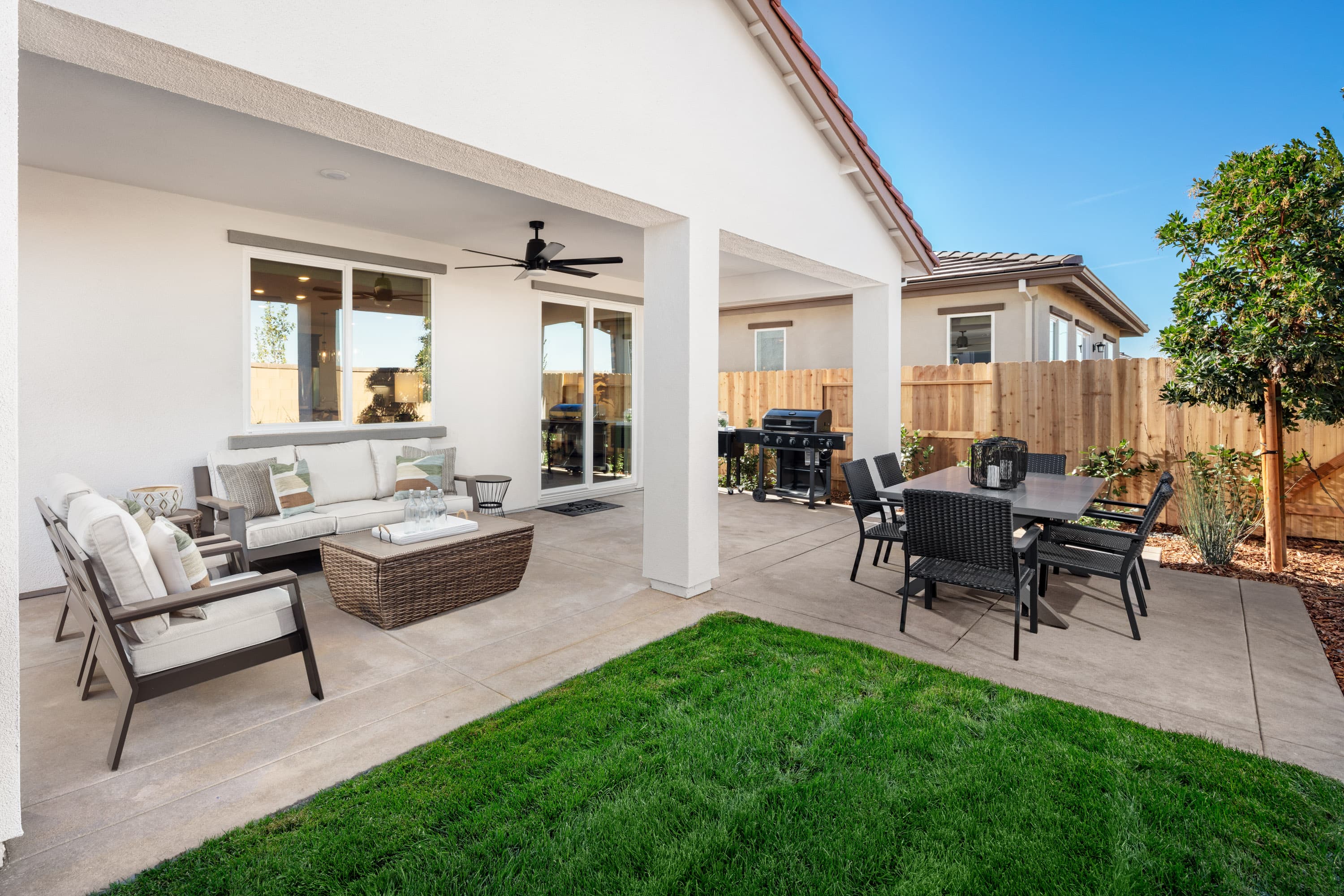 backyard with outdoor furniture and barbecue