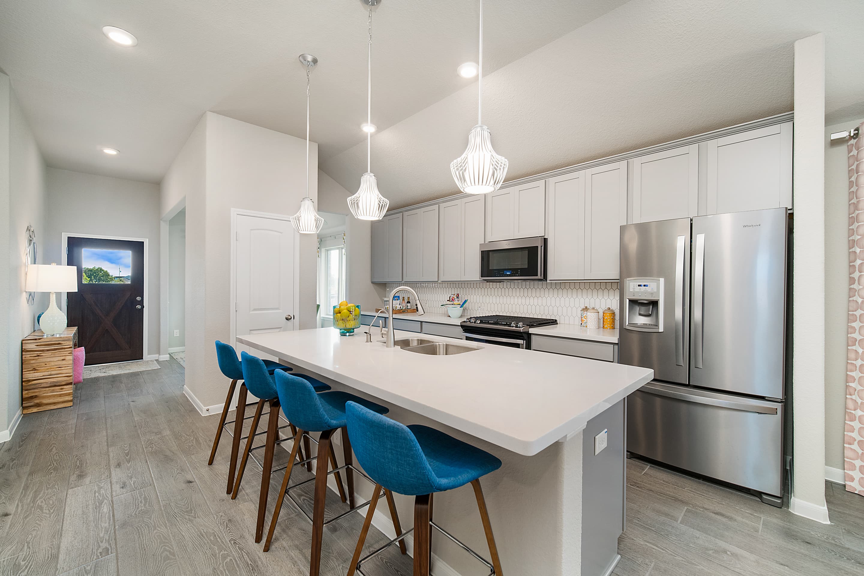 kitchen with large island and white cabinets 