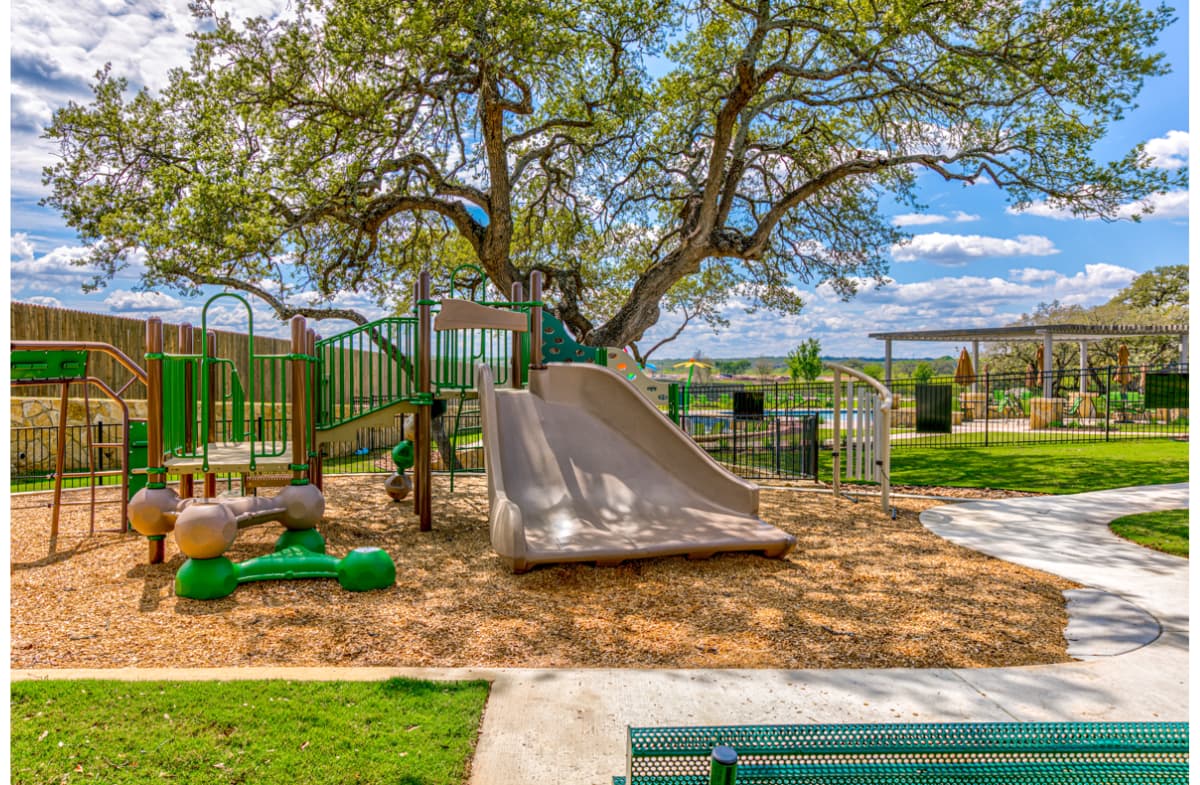 kids playscape with slide and climbing area