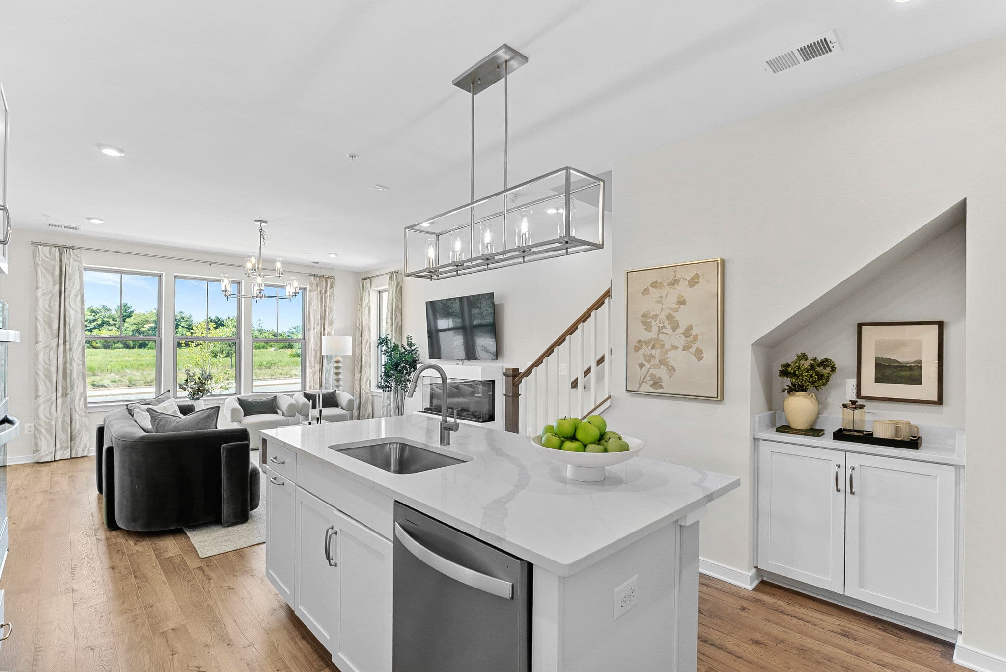 kitchen with an island with a sink