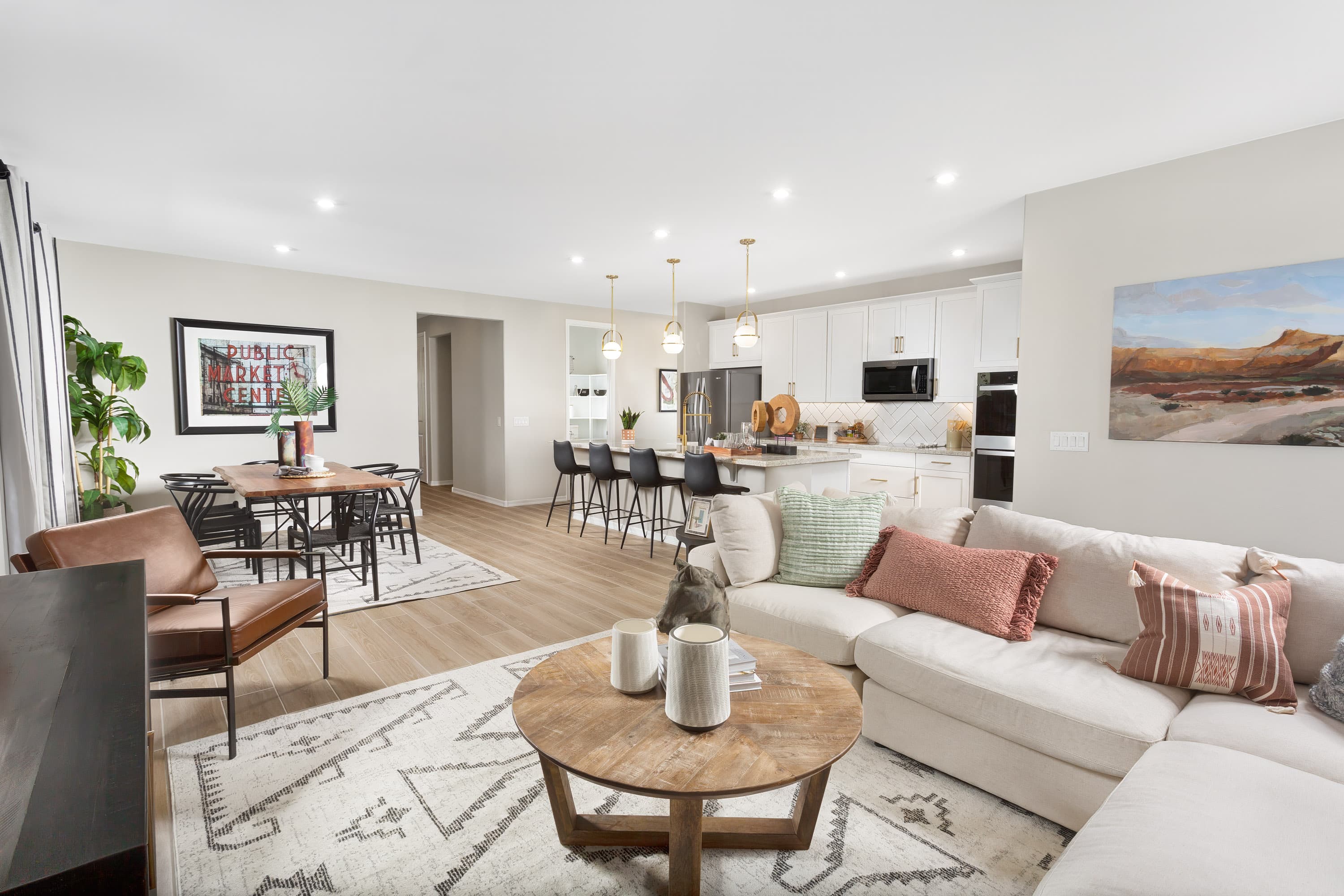 living area view with a sofa