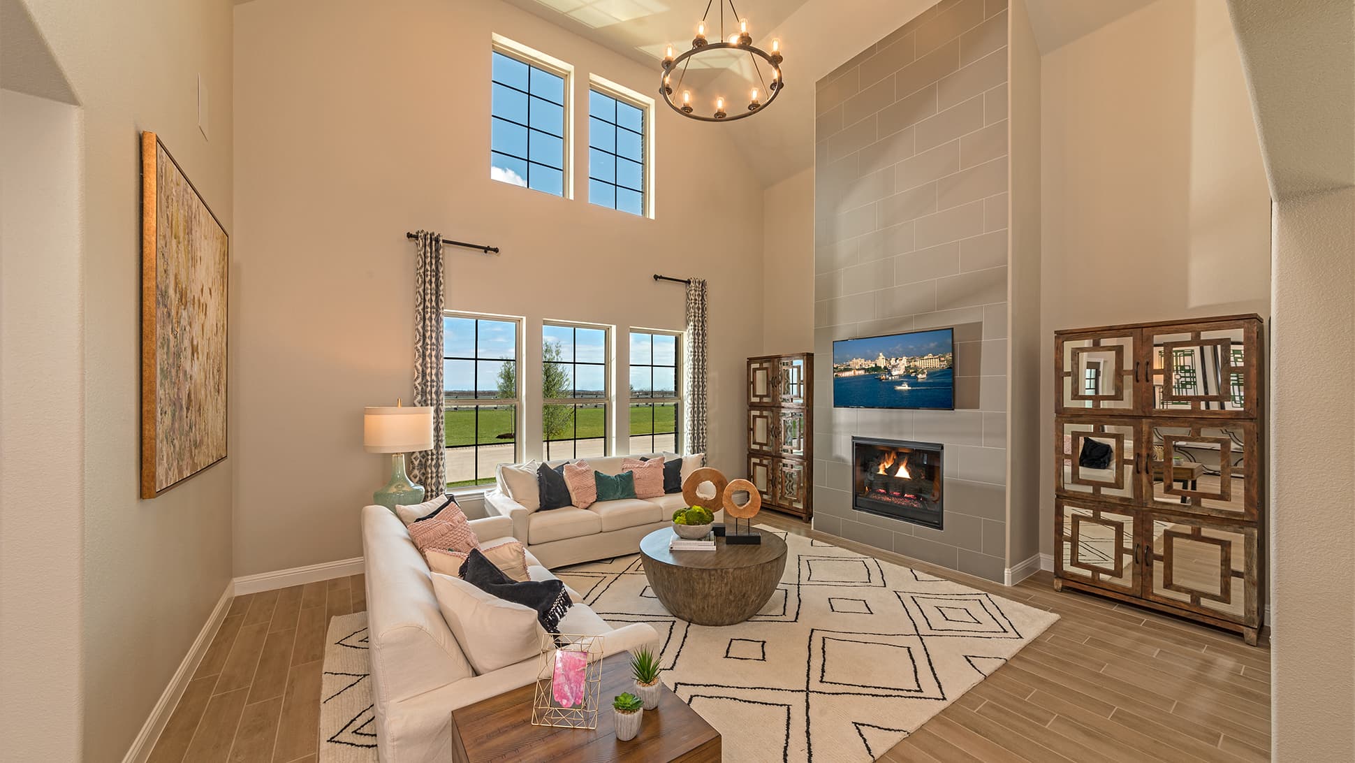 great room with tile floors and tall ceilings 