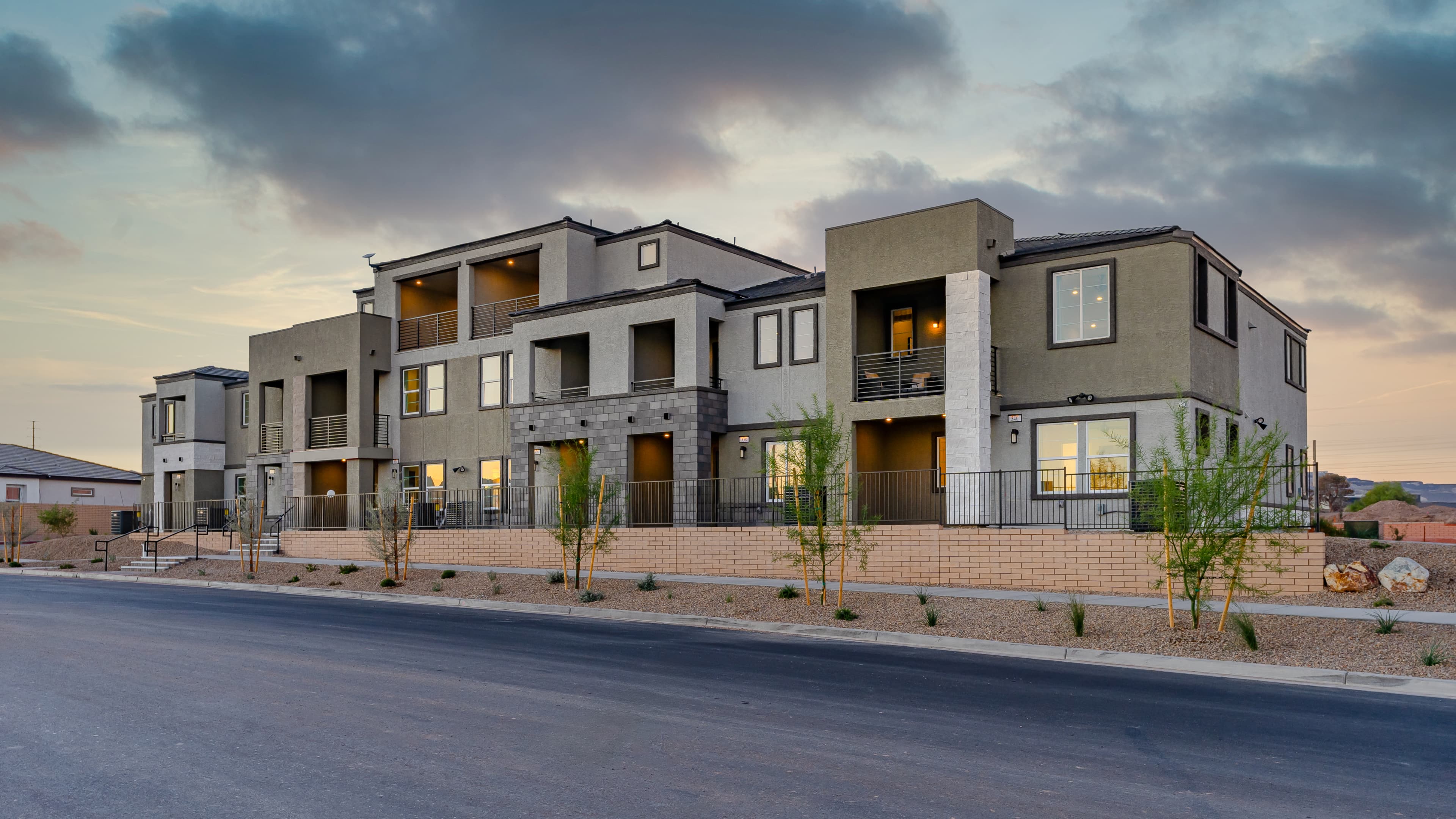 townhome building with desert landscaping 