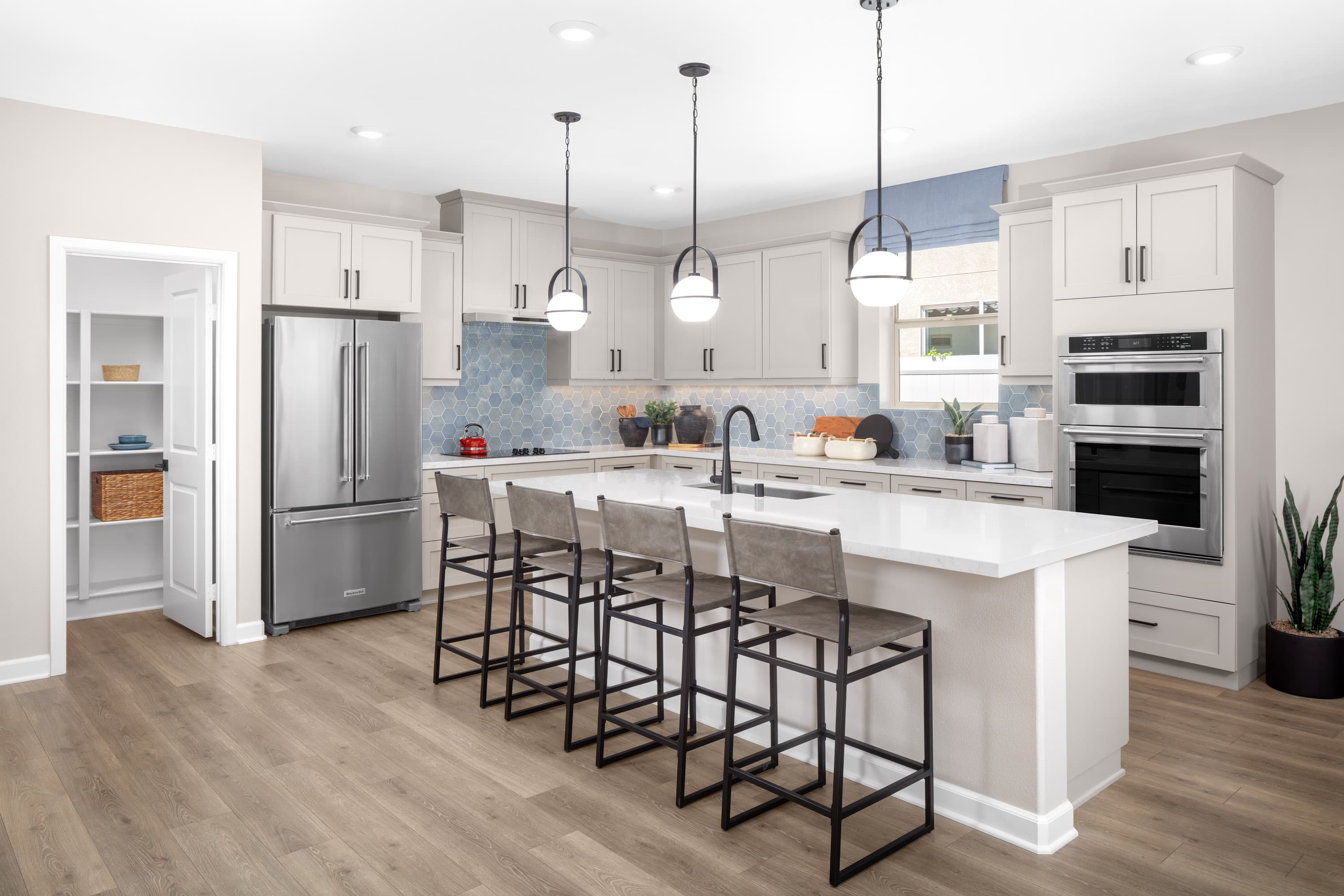 kitchen featuring a large island with a sink