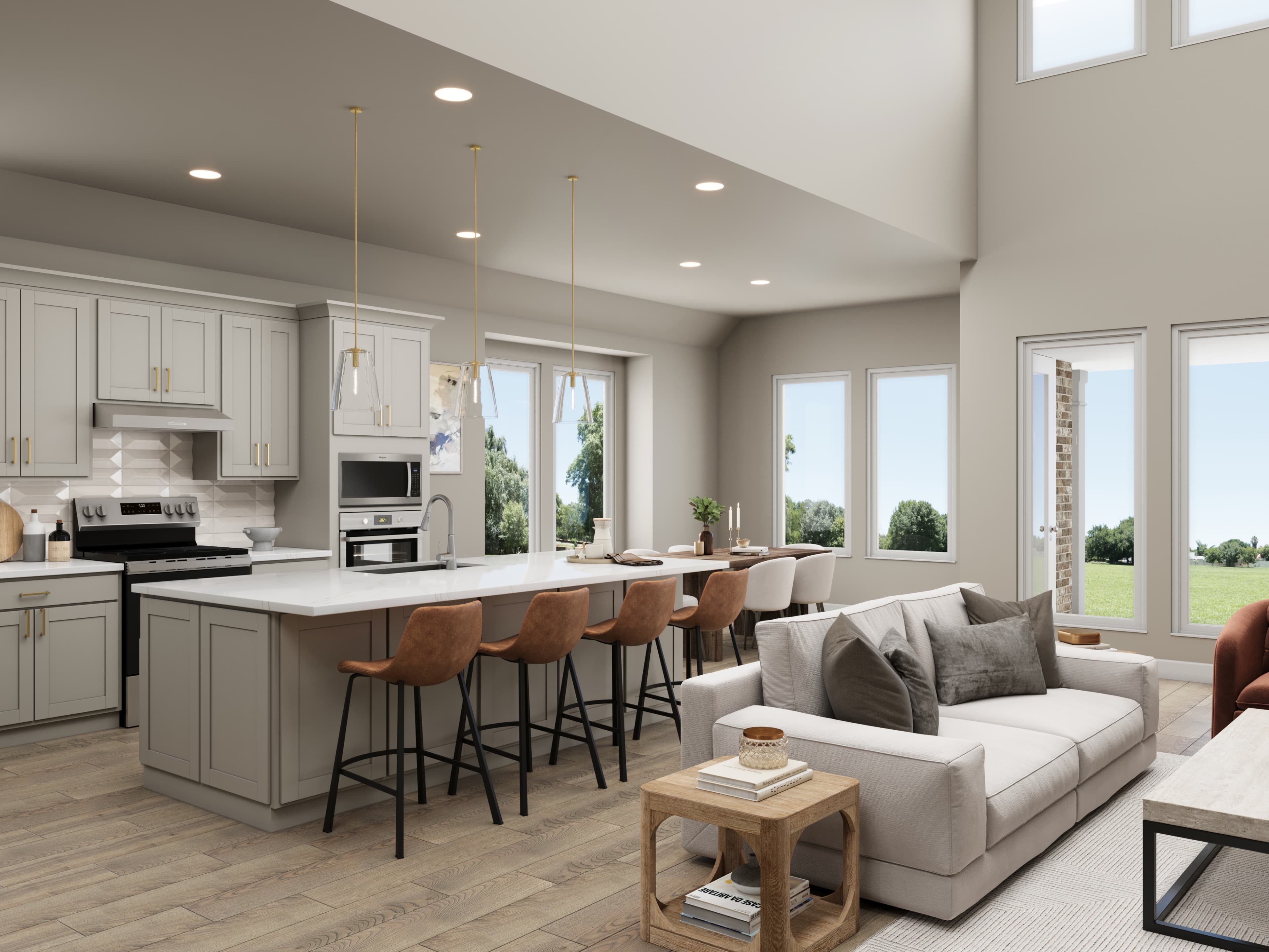 kitchen with gray cabinetry & island with pendants