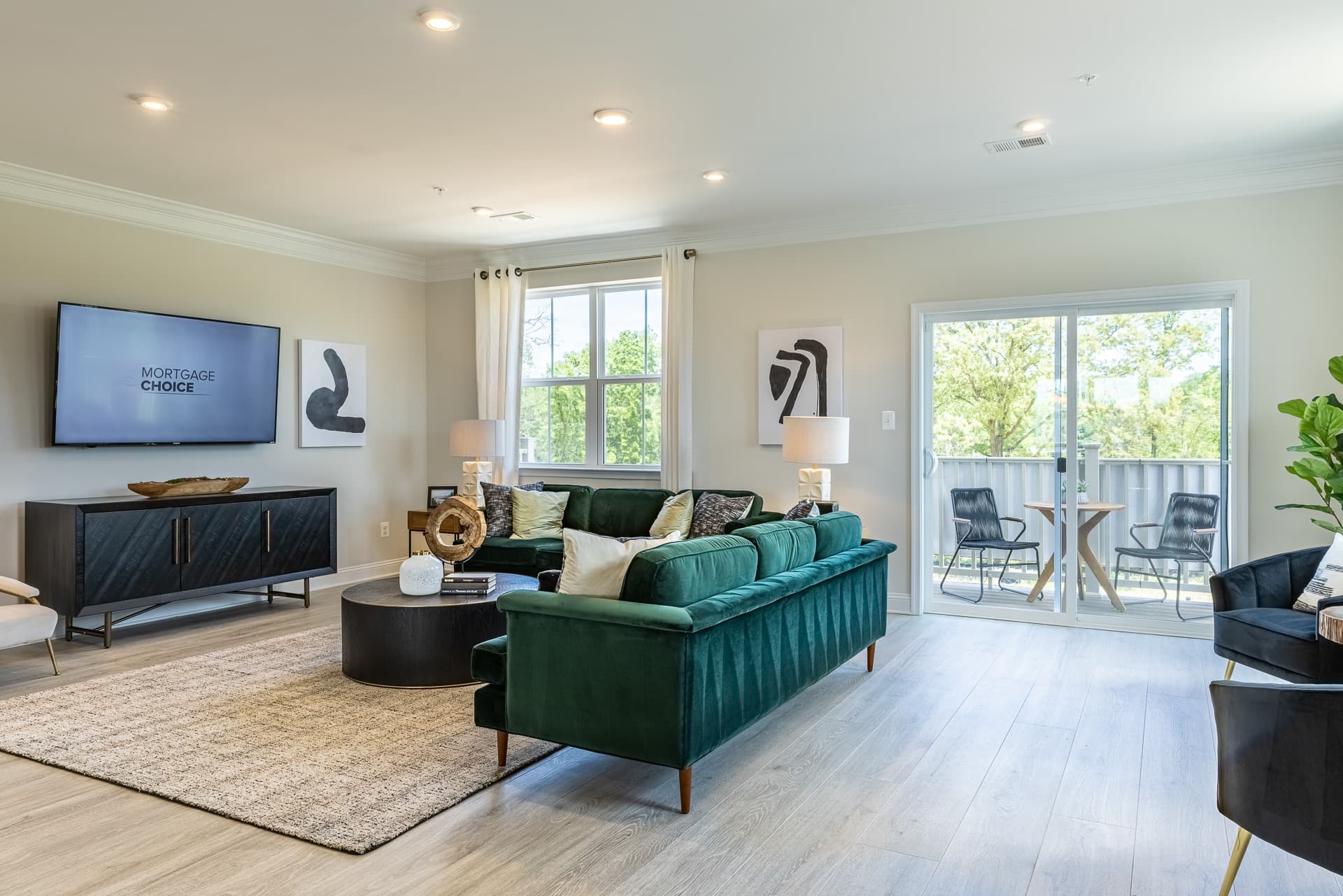 great room with a velvet green couch
